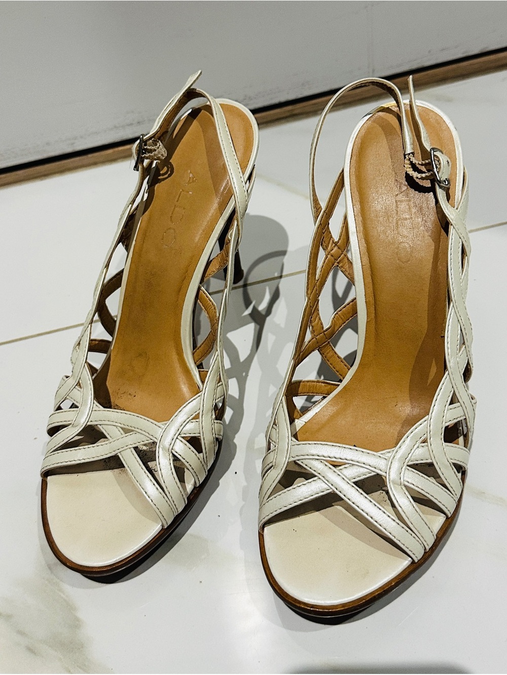 Women's White Strappy Slingback Heels by Aldo.